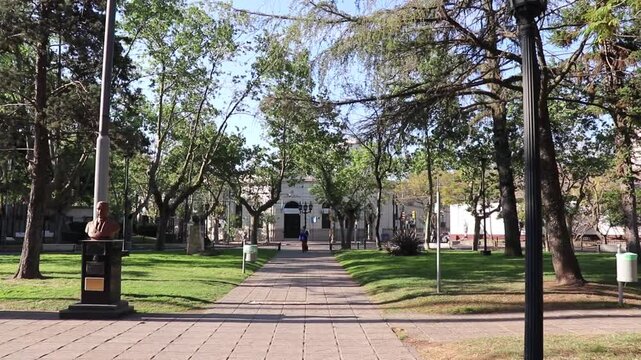 Walk and first-person view of Plaza Mitre in the city of Zarate on a splendid summer day