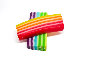 rainbow layer cake isolated on white background