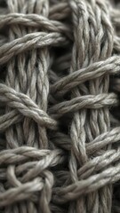 Intricate woven textile, close-up showing detailed fibers and knots, detail, wool