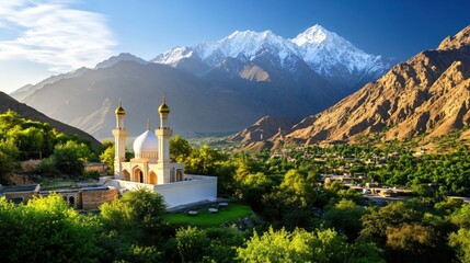 Scenic View of Snow-Capped Mountains Above Serene Mosque Surrounded by Lush Green Landscape