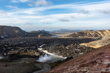 Landmannalaugar stunning landscape in Iceland with steam coming from the ground.
