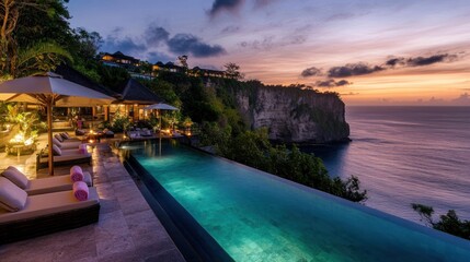 Obraz premium Serene sunset view from a luxury villa poolside.