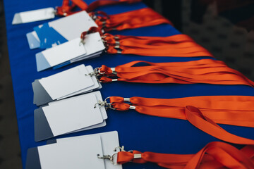 Process of checking in on conference congress forum event, registration desk table, visitors and...