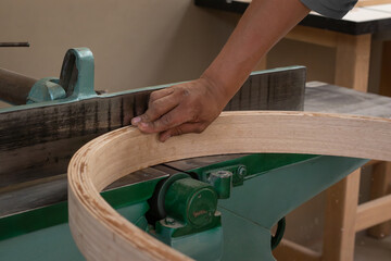 carpenter - craftsman applying wood bending technique