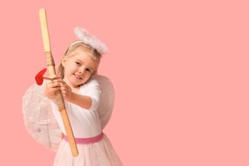 Cute little girl dressed as cupid with bow and arrow on pink background. Valentine's Day celebration