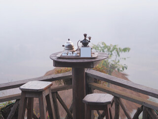 Vintage coffee set and empty board at coffee shop.