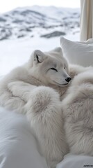 Naklejka premium White dog sleeping peacefully on a fluffy white blanket, snowy mountain view.