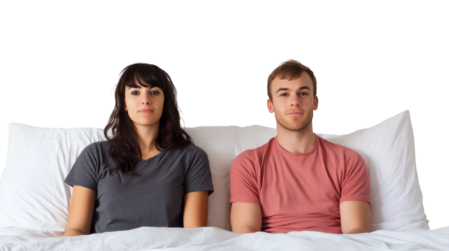 Unhappy couple in bed facing relationship challenges isolated on white background