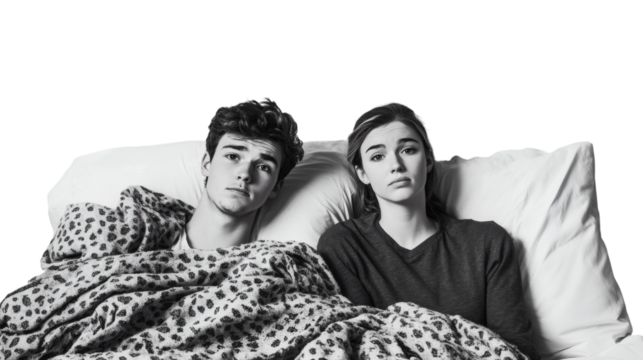 Unhappy couple in bed facing relationship challenges isolated on white background - Powered by Adobe