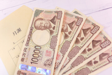 新紙幣一万円札と月謝袋