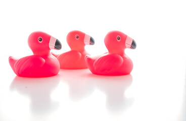 Three rubber toy pink Flamingos 