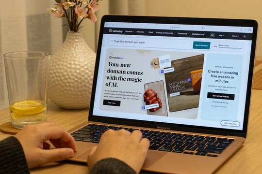 Daly City, CA, USA - Nov 25, 2024: Airo, a new AI-powered tool built to support small businesses, is seen advertised on the homepage of GoDaddy.com on the screen of a laptop computer.