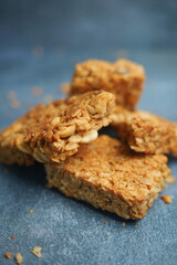 Delicious Homemade Granola Bars Stacked on a Blue Background