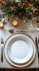 A beautifully arranged dining table featuring an empty plate, silverware, and delicate candles. Fresh flowers add charm, creating a romantic atmosphere perfect for a celebration