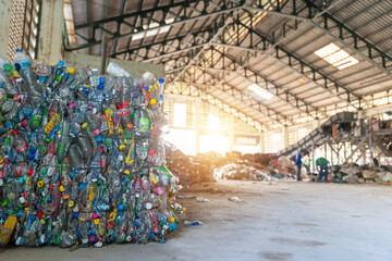 Plastics recycling centers and raw material in waste separation plant.