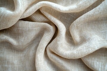 Beige fabric texture with soft, flowing drapes and subtle woven pattern.