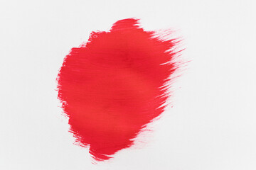 赤色と白いの絵具で塗った日本の国旗のような背景