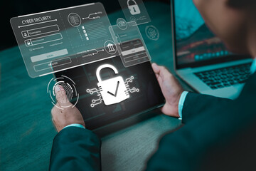 Businessman use a tablet with a fingerprint scanner for secure access, featuring a prominent digital lock icon and cyber security interface. Showcases modern technology for access authentication