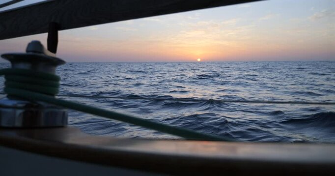 Sunset seen from a sailboat over the bay of Biscay in the Atlantic Ocean
