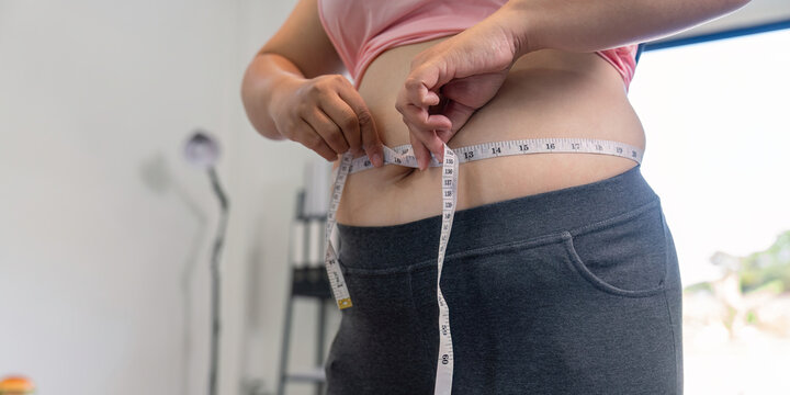 Measuring weight and fat loss journey home setting lifestyle change indoor environment personal growth concept