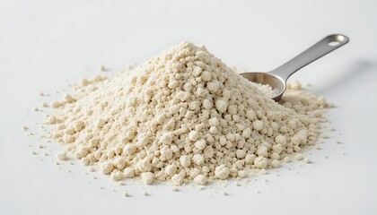 Close-up of a Pile of Off-White Granular Powder with a Measuring Spoon