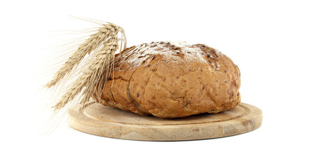 Freshly Baked Whole Wheat Bread on Wooden Cutting Board