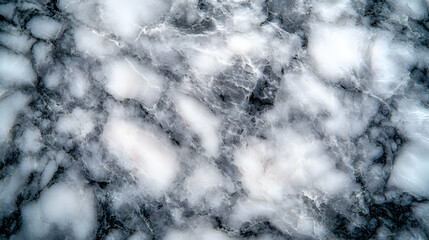 Stunning close-up of grey and white marble texture, showcasing its intricate veins and patterns, ideal for design backgrounds.
