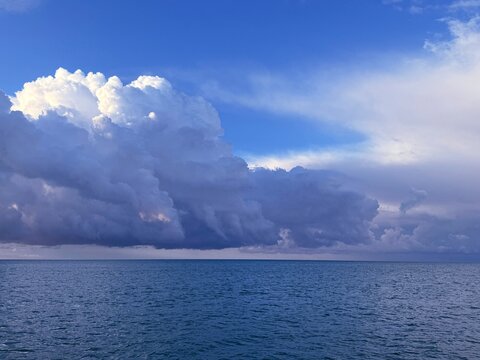 Dramatic sky clouds over sea at morning