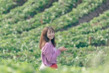 Obraz premium Beauty Girl Outdoors enjoying nature on the Spring Field, Sun Light.