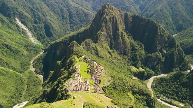 Aerial of Machu Picchu Inca Ruins and Huayna Picchu Mountain near Cusco, Orbit