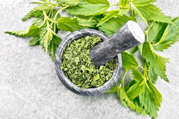 Nettle dried in mortar on stone top