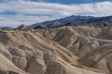 Zabriskie Point, Death Valley National Park, California. Playa and playa margin rocks of Furnace...