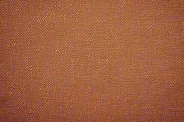 Close-up textured brown fabric background.