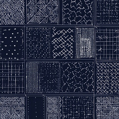 Midnight Indigo Patchwork: Abstract textile design featuring a navy blue background adorned with a collage of white geometric patterns and textures.  A seamless repeat for fashion, home decor.