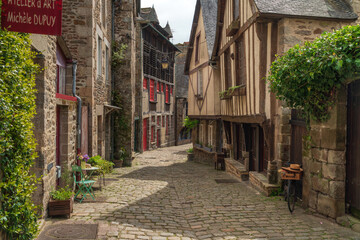 View of the medieval street of the city with half-timbered houses descending to the embankment of...