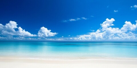 Fototapeta premium Vibrant blue sky complements the serene beach scene.