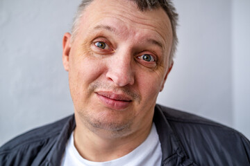 distorted face of sad and grieved very upset person, dissatisfied with his hard fate