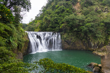 Fototapeta premium Taiwan’s Shifen waterfall a hidden gem in nature