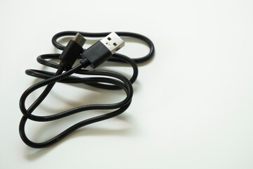 Charging cable, battery on a white background