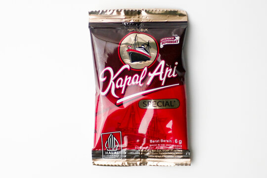 Close up a pack of Kapal Api Coffee sachet isolated on white background. front view