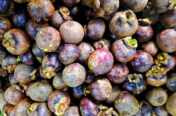 Pile of Mangosteen or Garcinia mangostana fruit