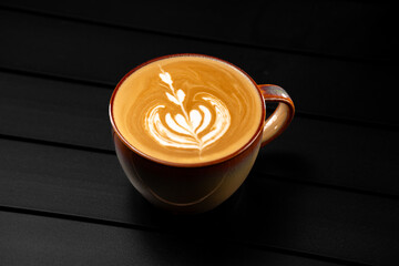 Latte coffee on a black background