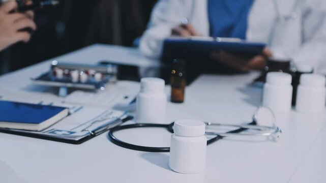 Team, medical analysts and doctors consulting with paperwork of graphs, data and charts in hospital conference room. Closeup of healthcare staff discussing statistics, results and innovation strategy