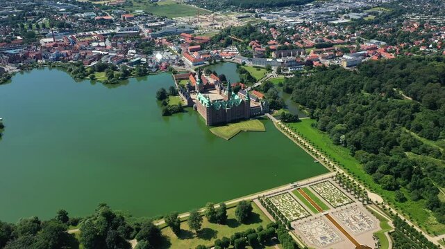 Slotssoen Lake And Frederiksborg Castle With Baroque Garden In Hillerod, Denmark. - aerial shot