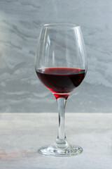 Glass goblet with red wine