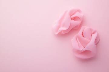 Fototapeta premium Delicate Pink Fabric Drapes on Soft Background Elegant Minimalist Texture Design