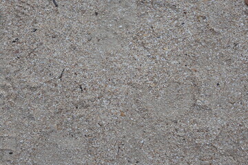 Wet white sand on beach
