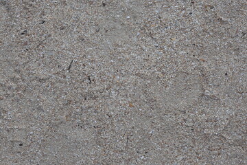 Wet white sand on beach