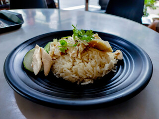 Explore affordable food in Singapore's hawker centres and coffee stalls. — delicious soy sauce chicken rice from a hawker stall in Singapore.