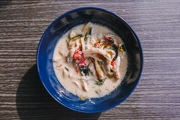 Tom kha kai, Thai coconut soup is a spicy and sour hot soup with coconut milk.